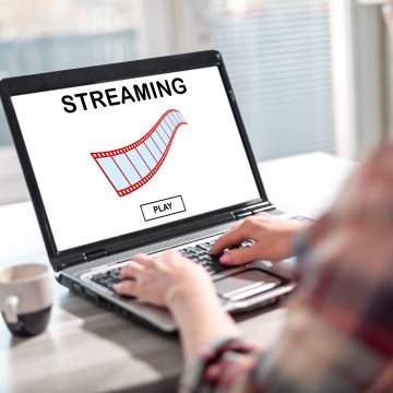 vpn content other continents woman streaming from laptop